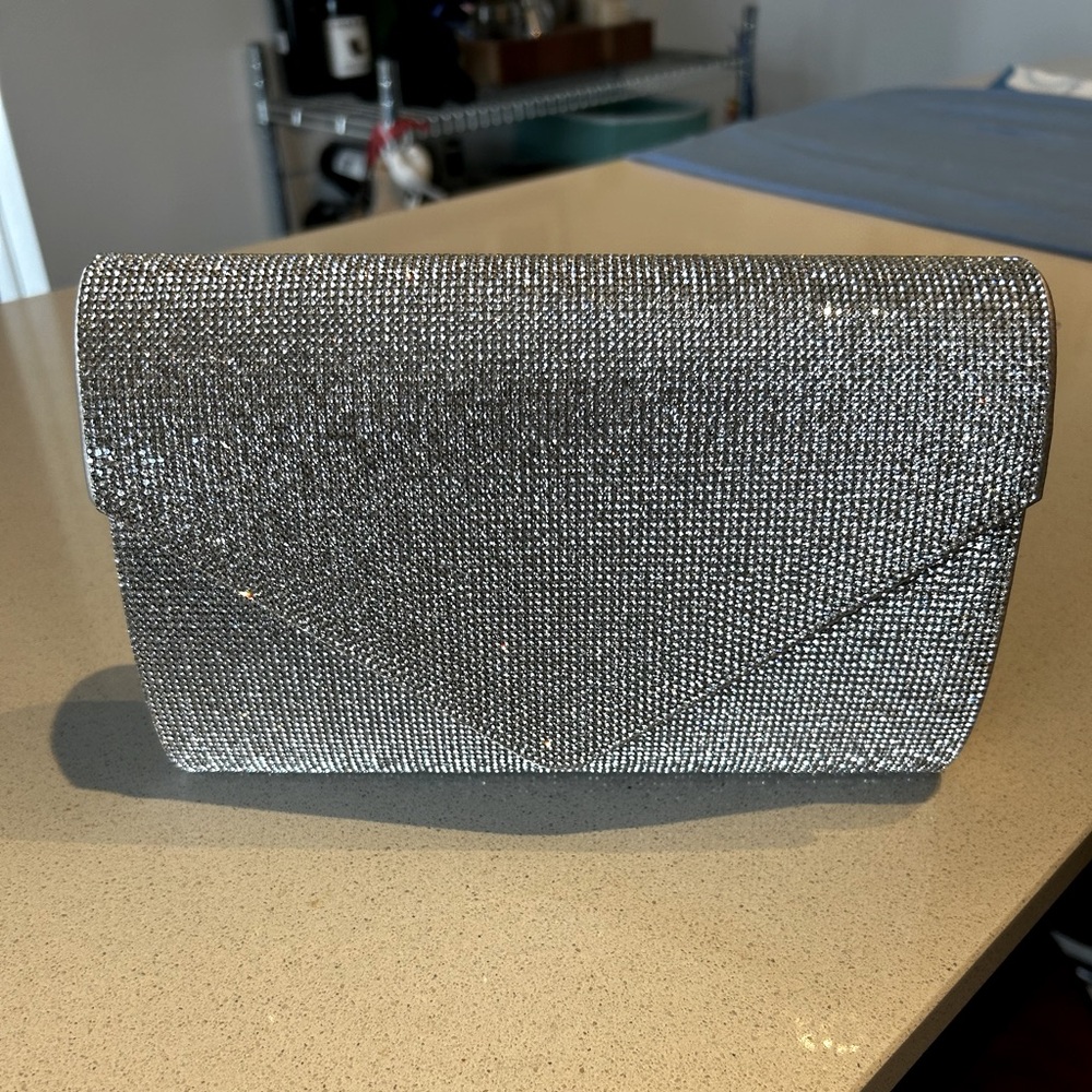 Geaven crossbody clutch, Aldo. Used once for wedding!purchased $60 CAD. $25 obo